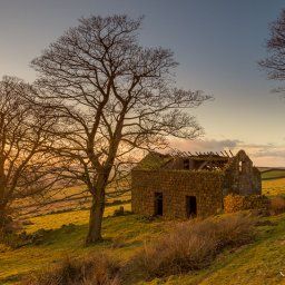 Roach End Barn at sunset, an old derelict out building which was probably part of Roachend Farm.